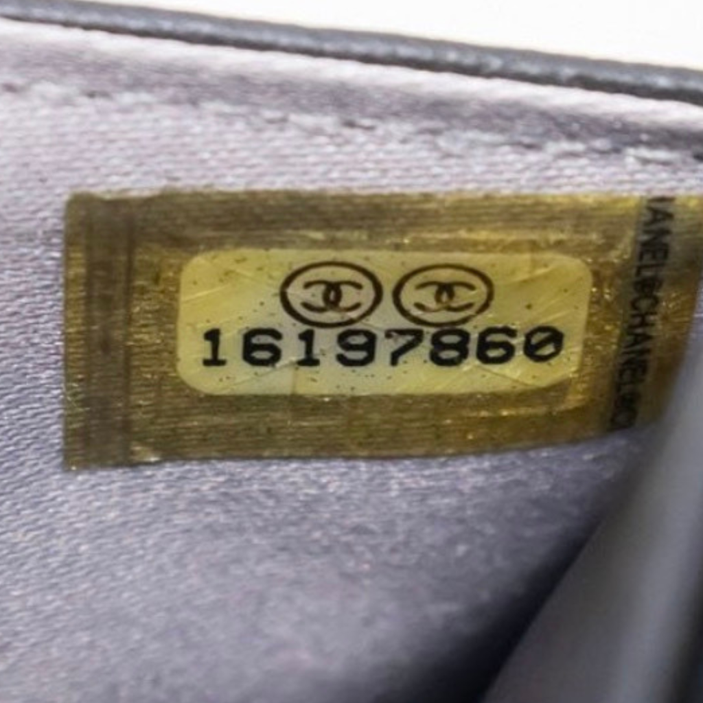 Chanel Camellia Embossed Wallet on Chain